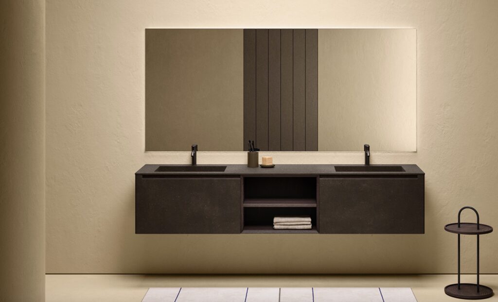 Charcoal vanity beneath rectangular mirror with white rug