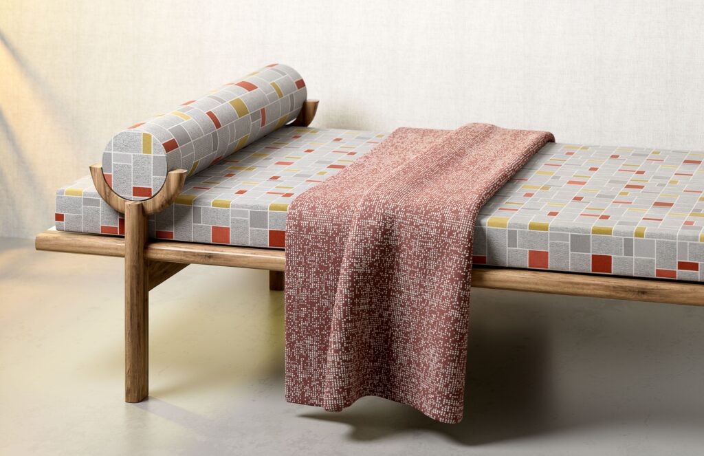 Glassworks textile on chaise and pixelate textile on throw