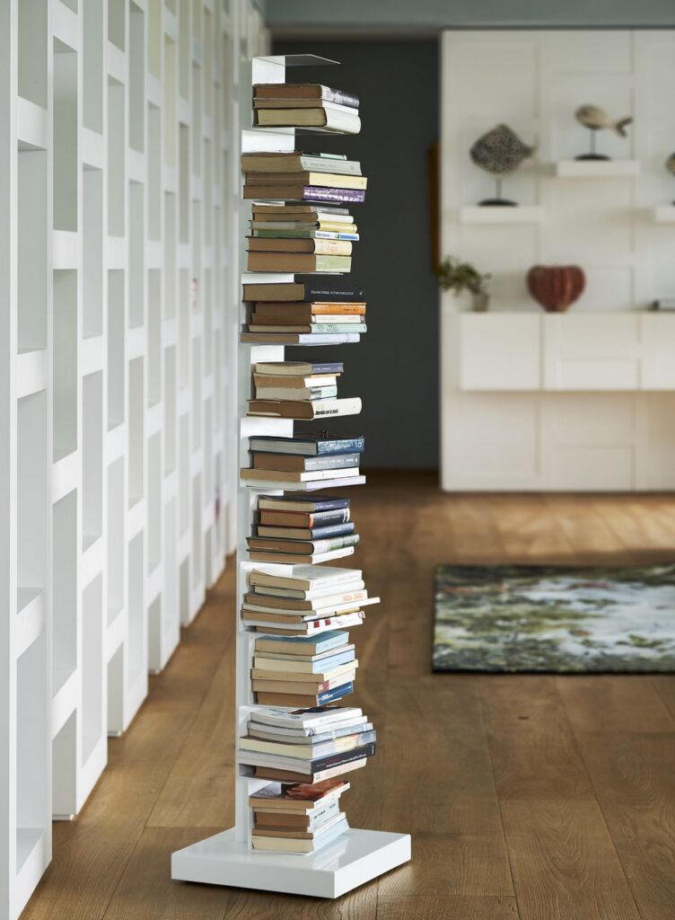 Ptolomeo bookcase in nice living space, partially full