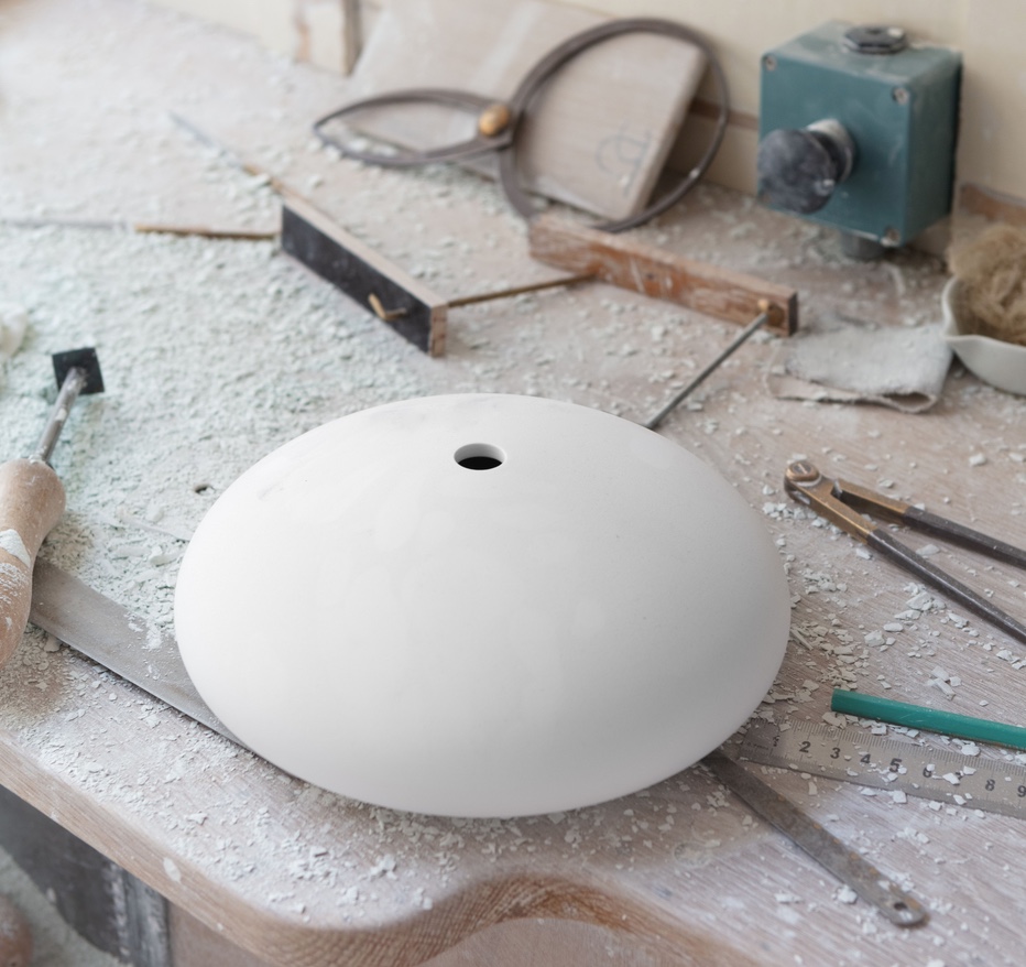 In process image of corolla in bare clay before firing