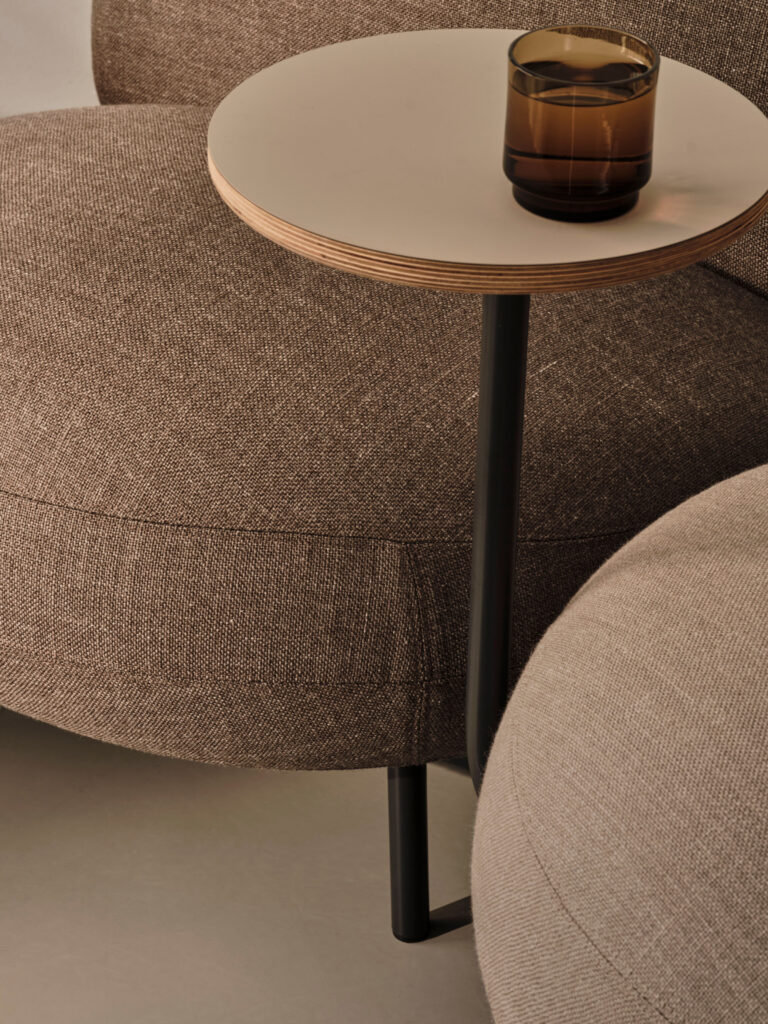 Detail brown chair and table with glass of water