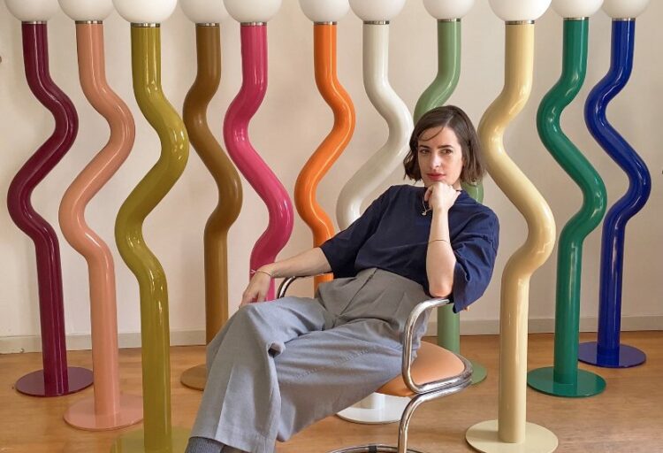 The designer with several straw lamps