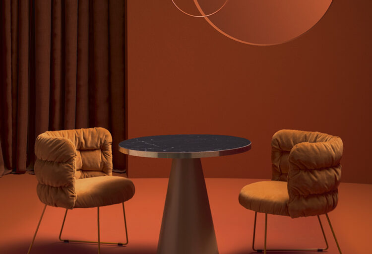 Maja chair in restaurant setting with red walls and curtains
