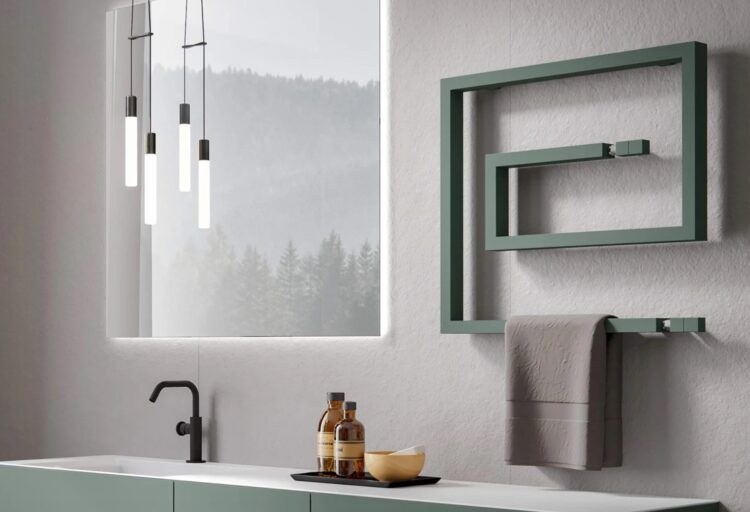 Snake towel rail in green next to window