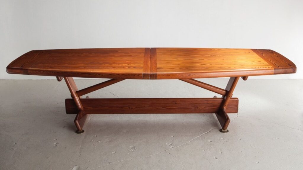 view from front of iconic dining table by Sergio Rodrigues