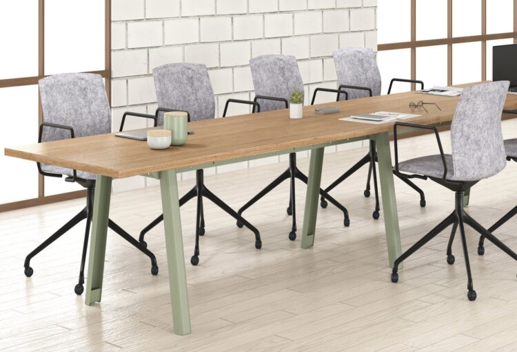 Theo long conference table in nice workspace
