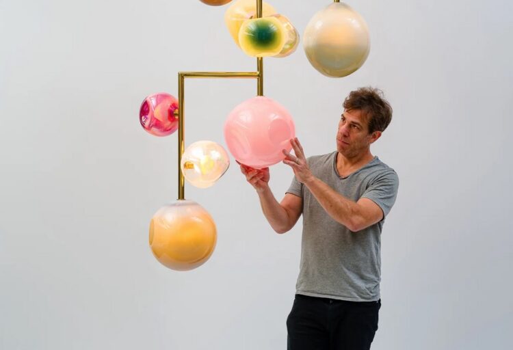 The designer with chandelier