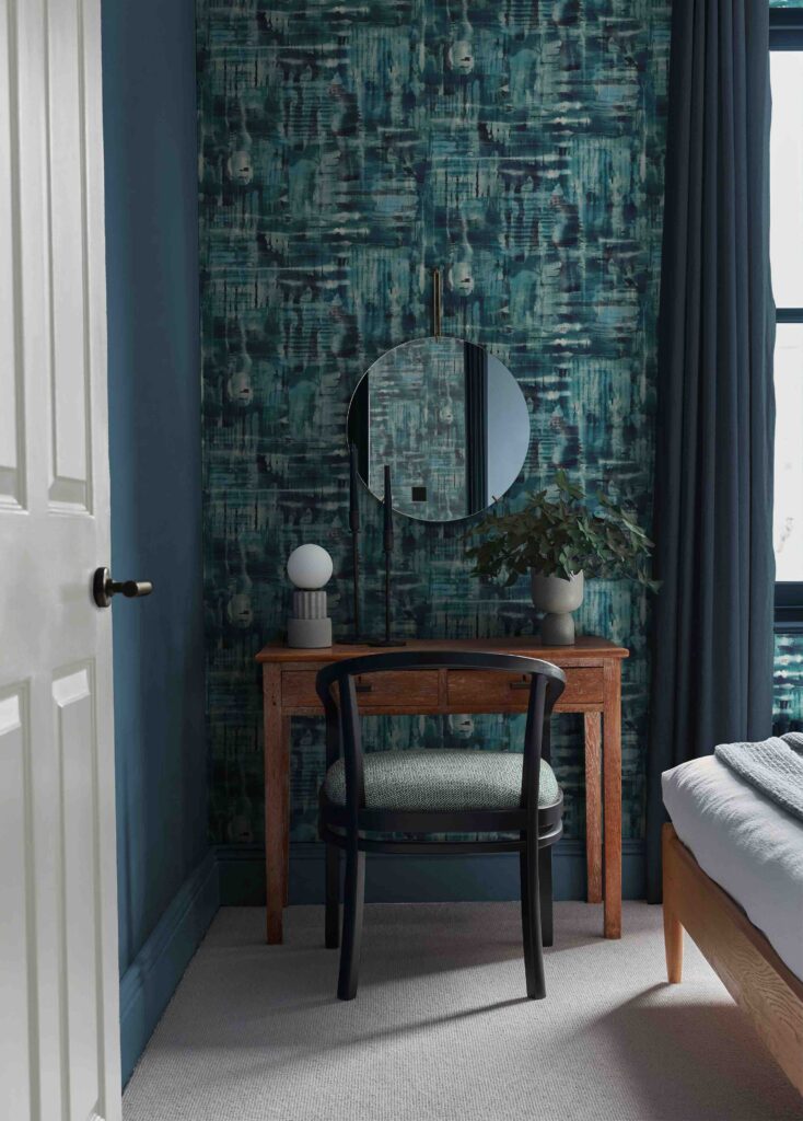 Reecho wallpaper fuzzy vertical and horizontal lines kind of like an inkblot in greens, blues, whites