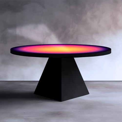 Pyramid table with black base, black radius, and interior of yellow, magenta, purple