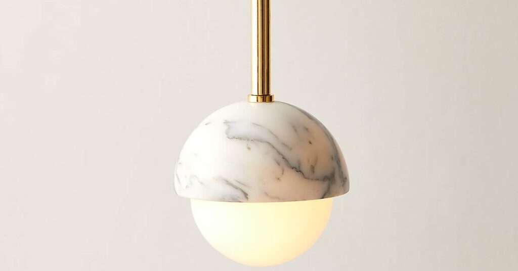 Polaris White Marble and Brass Globe Pendant Light by CB2 Polaris White Marble and Brass Globe Pendant Light by CB2