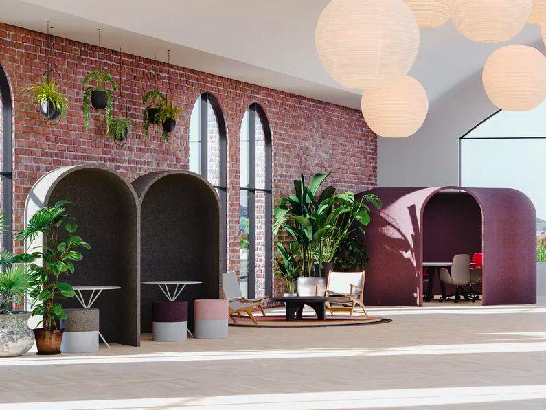 Aeonica in situ in a bright, large workspace in burgundy and dark greige colors