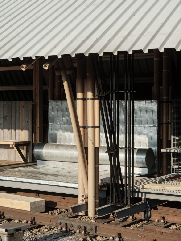 module with steel and wood close to tracks