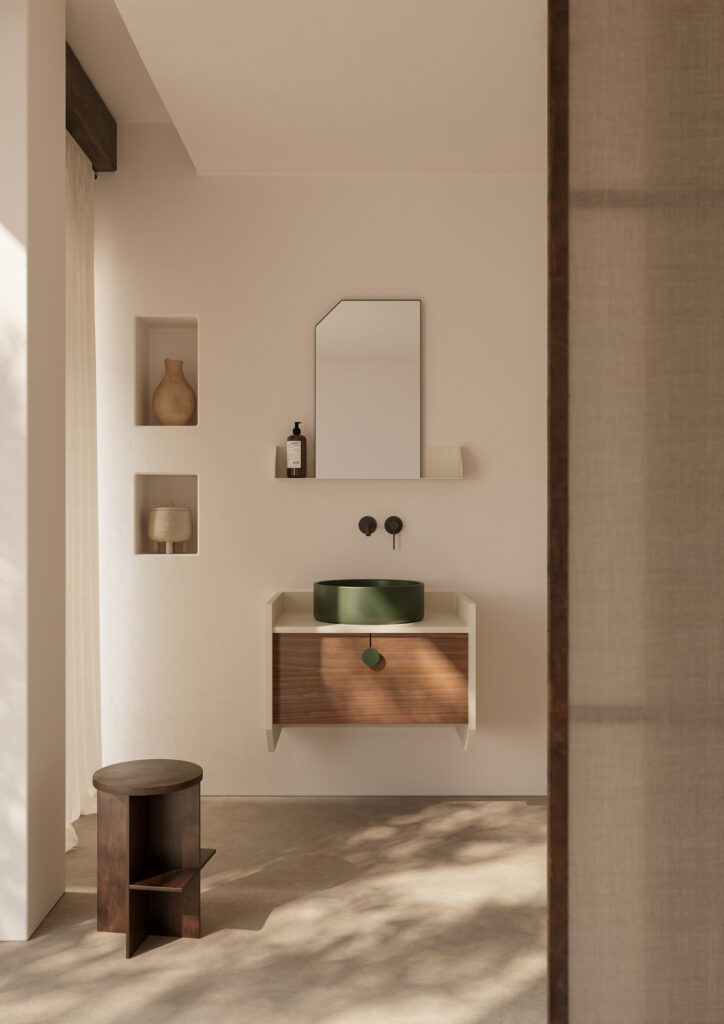 Bathroom with wooden vanity and raised green sink with circular wooden bench