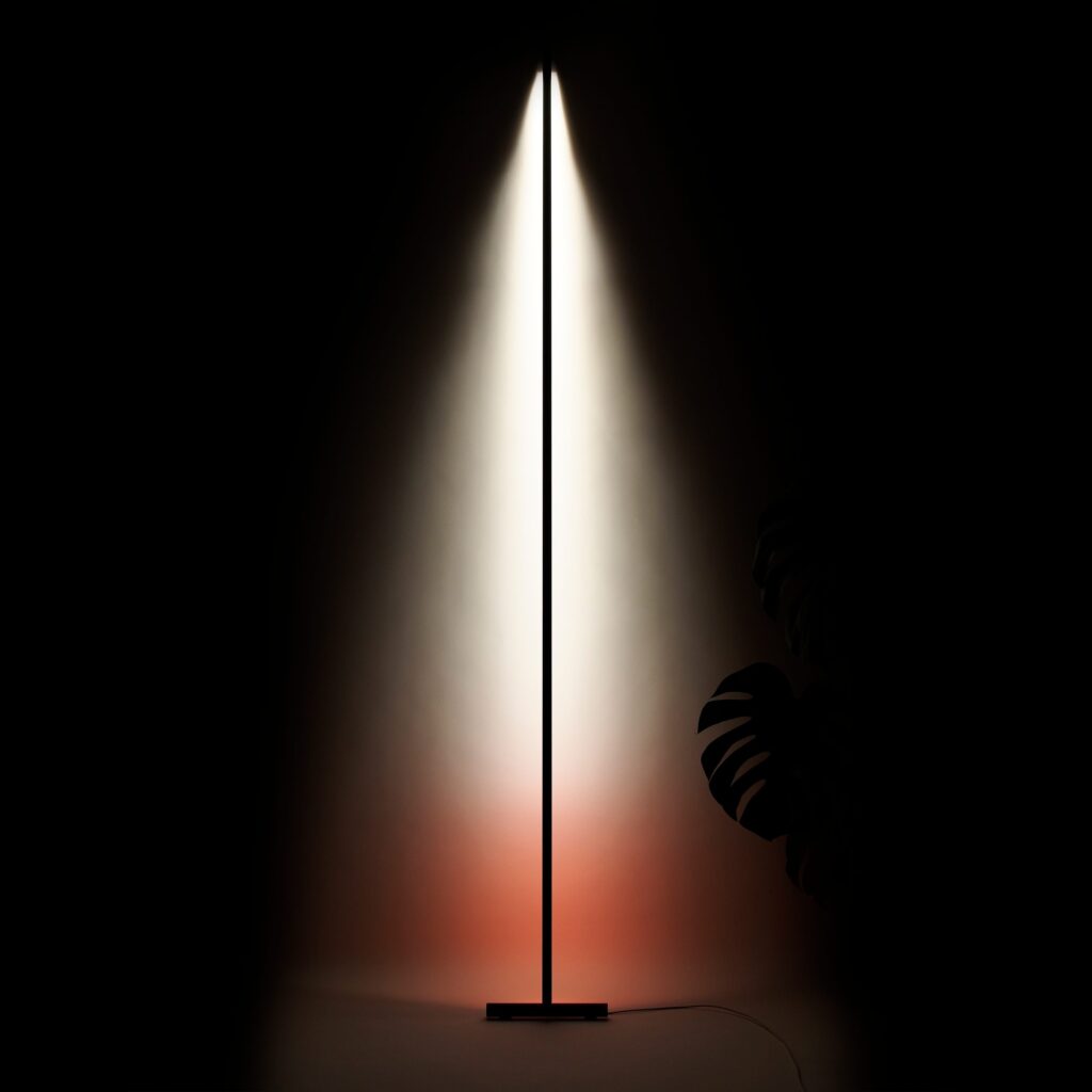 Illuminated in the dark with a cone of rainbow light