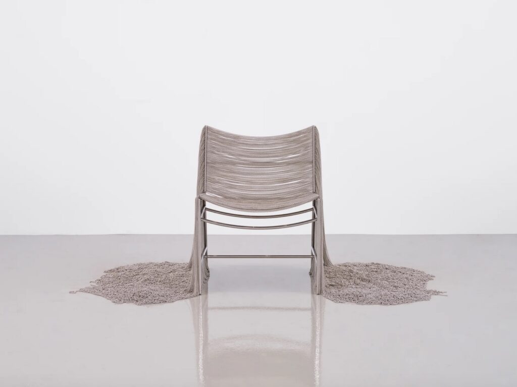 Creek Chair front view with pools of nickel beading