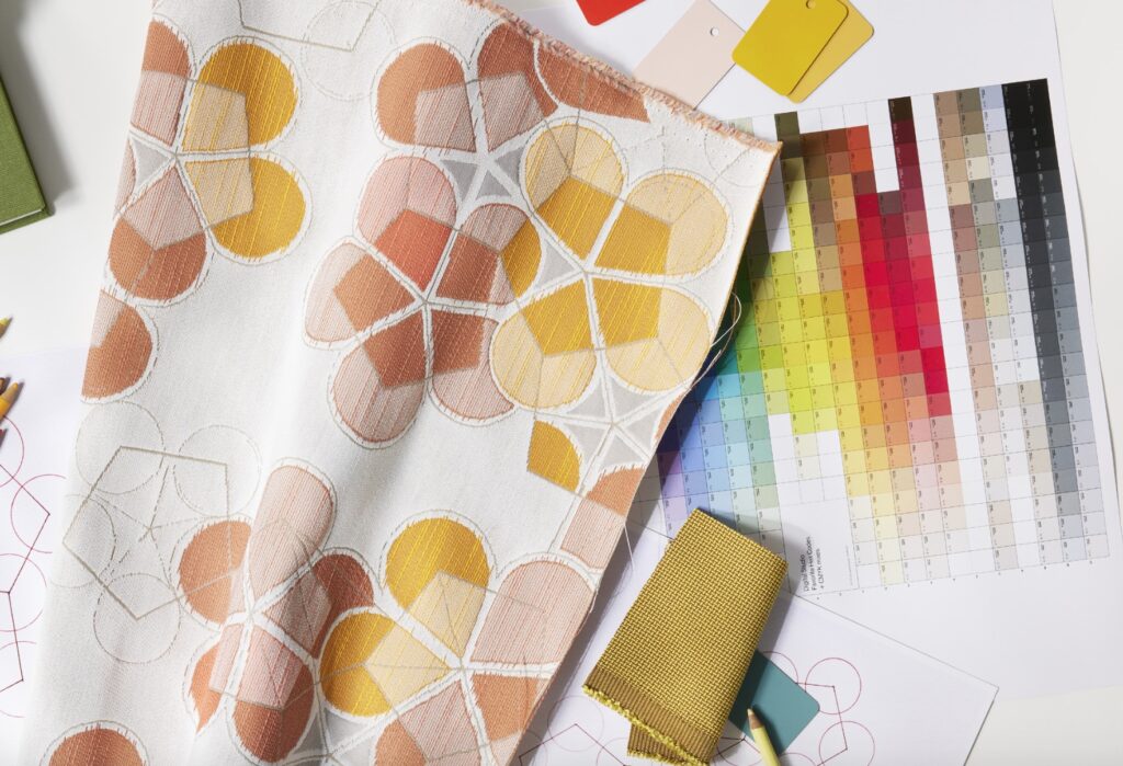 Pentimento mood board with fabric in pale yellows and pinks