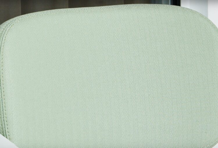 Broken Twill green upholstery on chair detailed view
