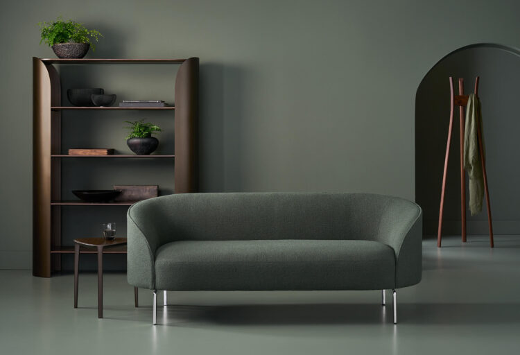 Arcular green two-seater in dark room