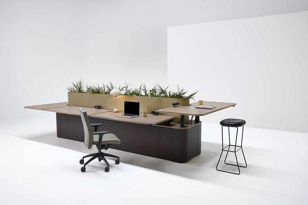 table with task chair and stool at high desk section