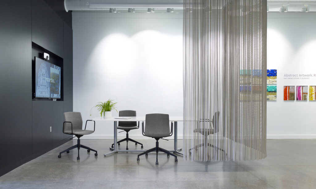 Celebrate chairs upholstered with arms and swivel base in gray