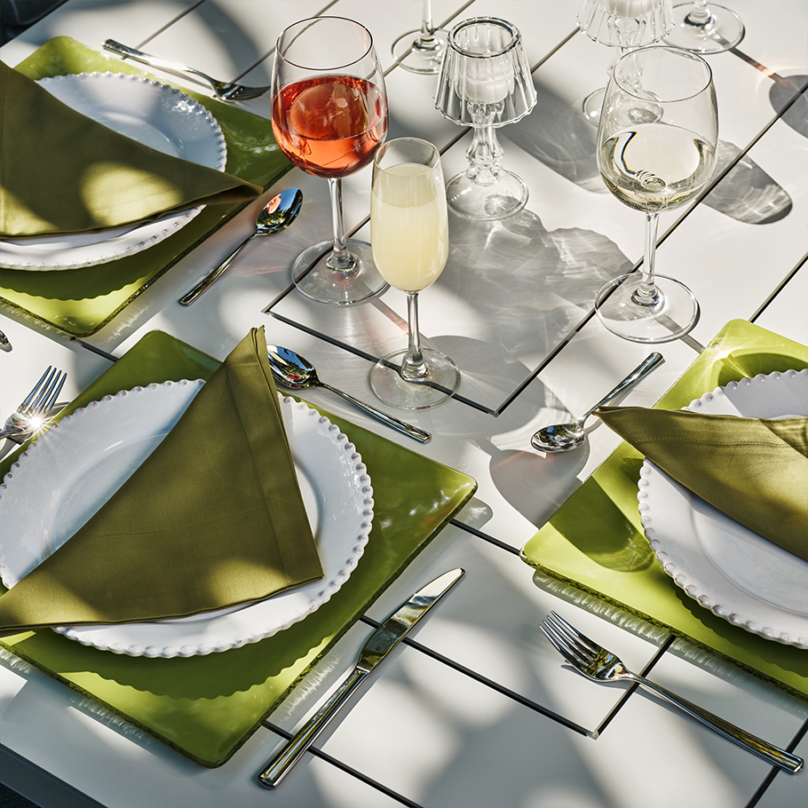 Detail of Savannah dining table with elegant place settings