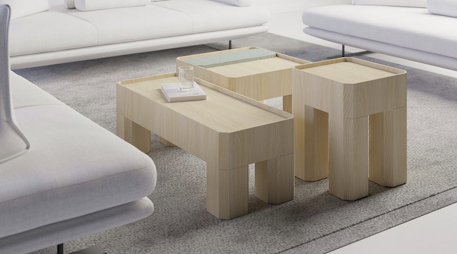 A cluster of Block Tables on a living room rug