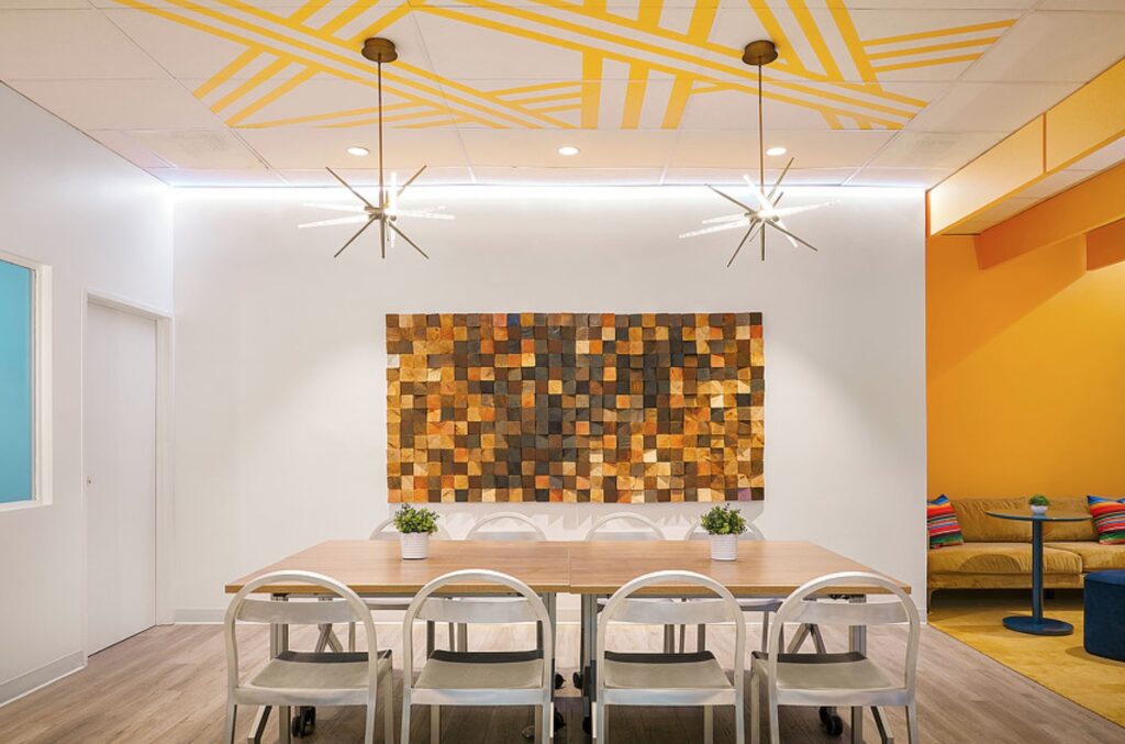 Reach L.A. dining room space with wood block art feature