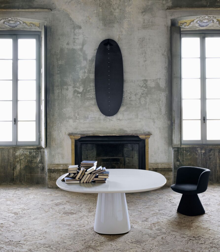 white table and black chair in fancy country-estate style room