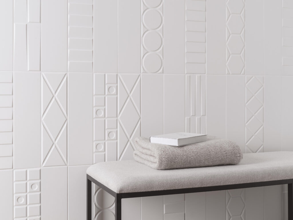 White detail with bench, blanket, and book