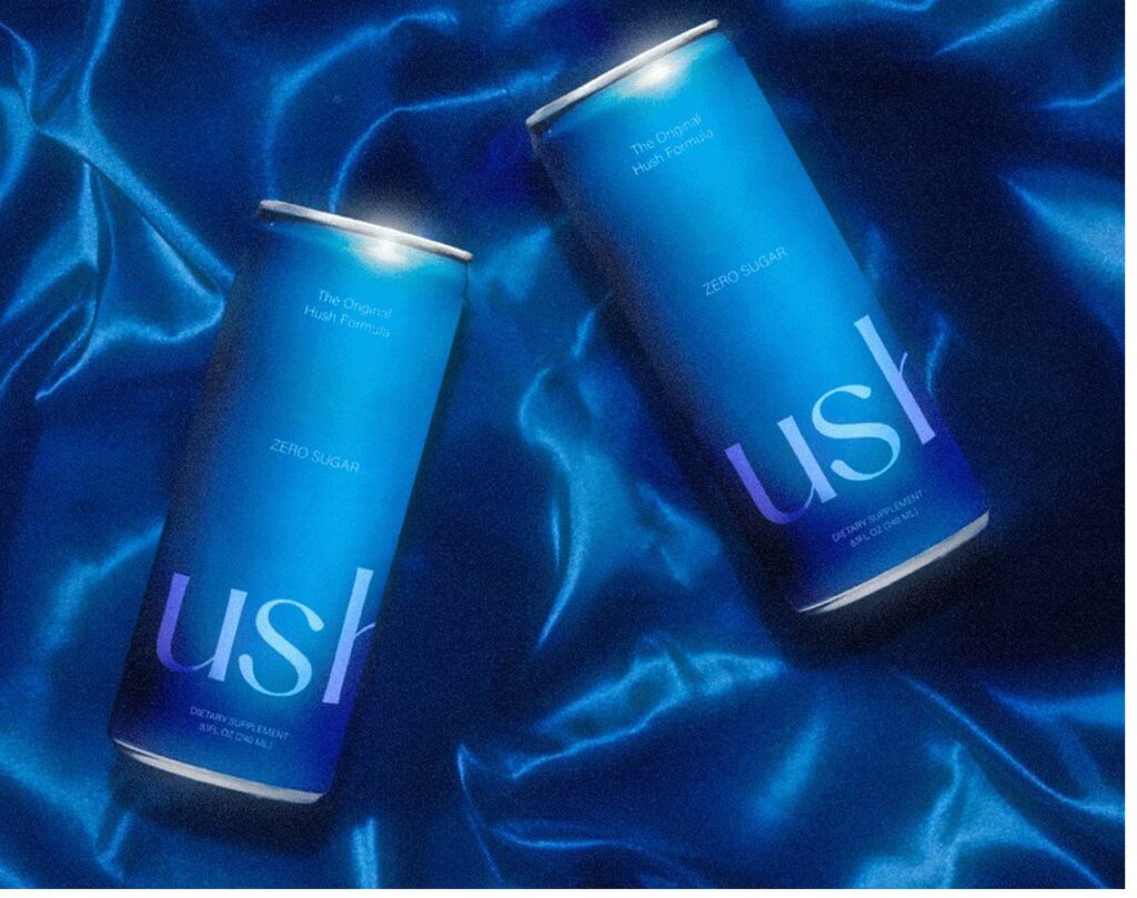 Hush two cans on blue silk background