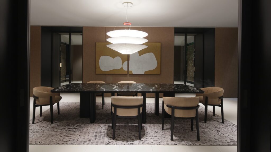 Adrien black long rectangel in conference setting