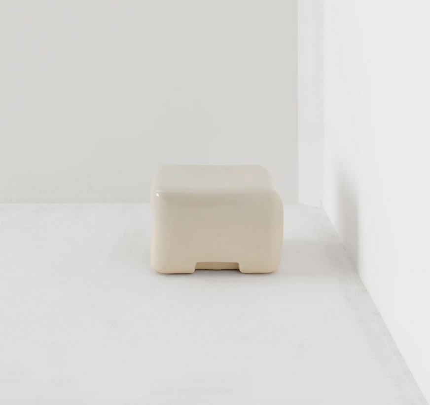 Cream in white room