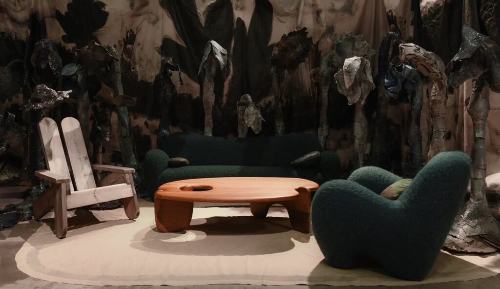 Scene with furniture and cardboard sunflowers by Studio Toogood