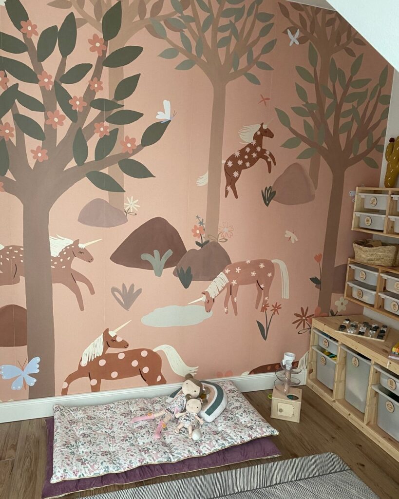 Unicorn motif wallpaper in kids' room