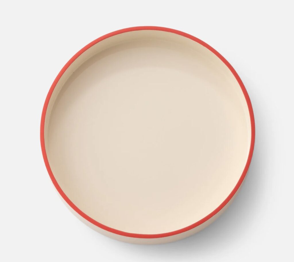 Schoolhouse tray. Circular version in Cream with orange edge.
