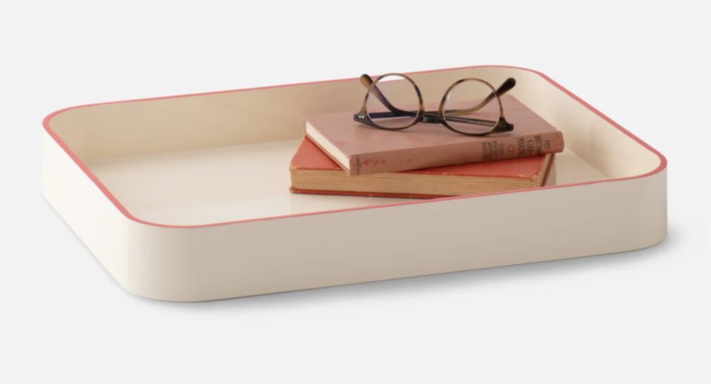 Cream with books and reading glasses