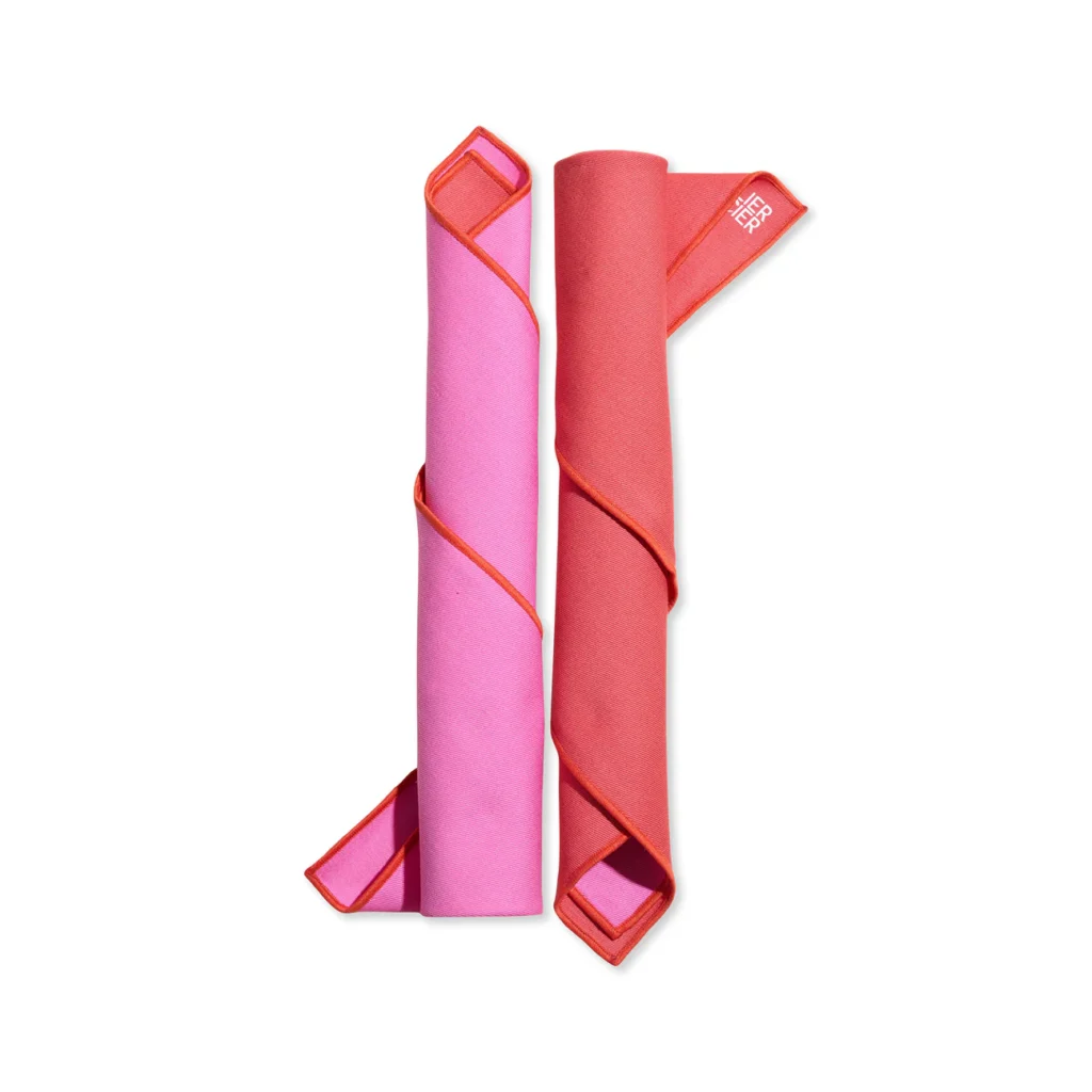 Lollipop Reclaimed Two-Tone Napkins rolled around silverware