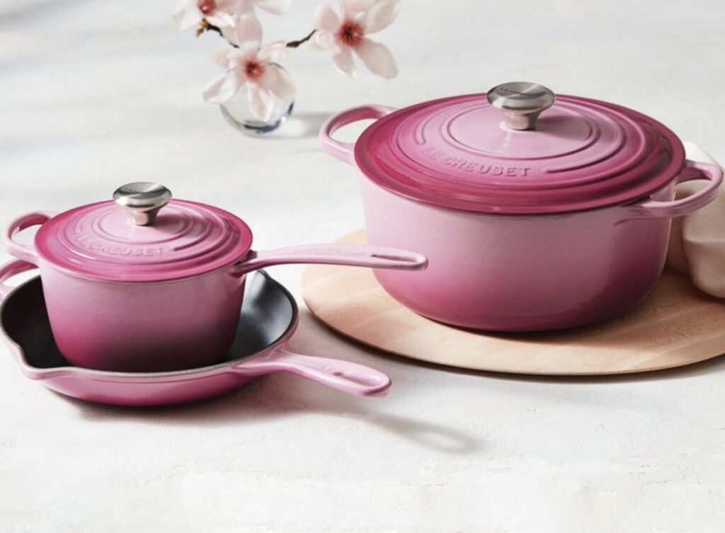 Le Creuset Signature Round Dutch Oven in Berry with other cookware