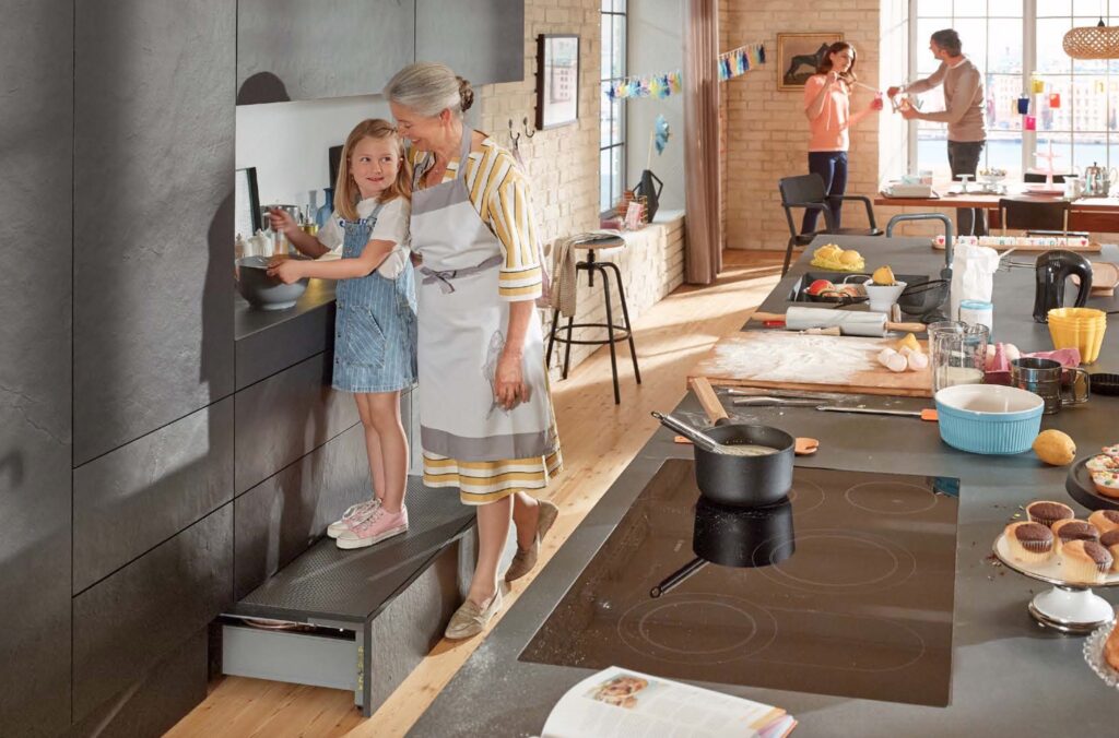 scene in kitchen with grandma and granddaughter using Space Step