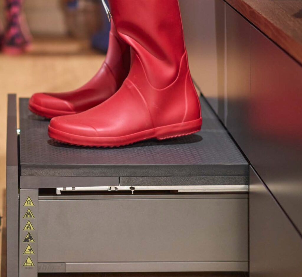 Space Step detail with red boots