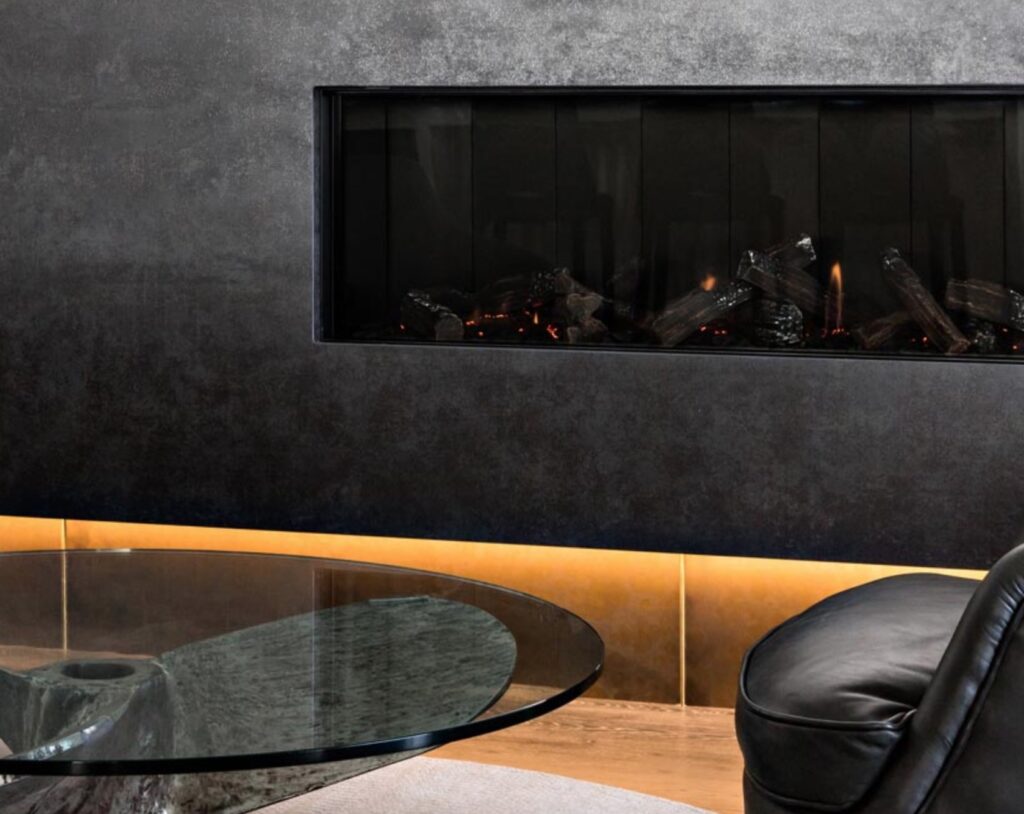 Chemetal nickel wall panel as fireplace surround