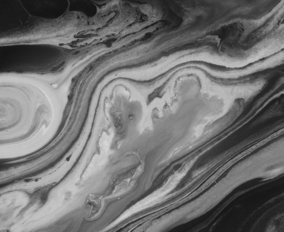 Image of natural striations resembling sand or water