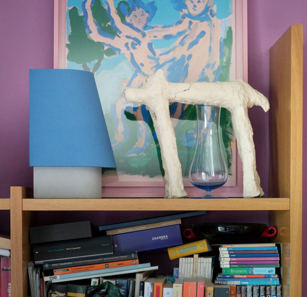 Blue lamp with abstract horse sculpture
