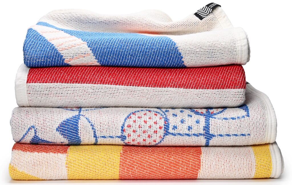 Towels/blankets in folded pile of four