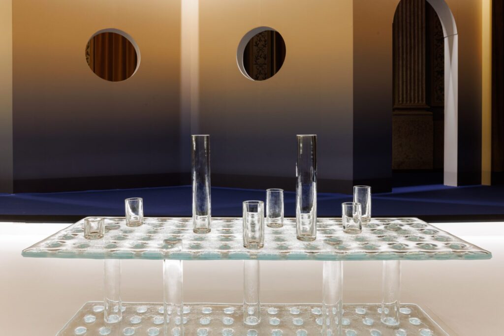 glass table with perforations and vials