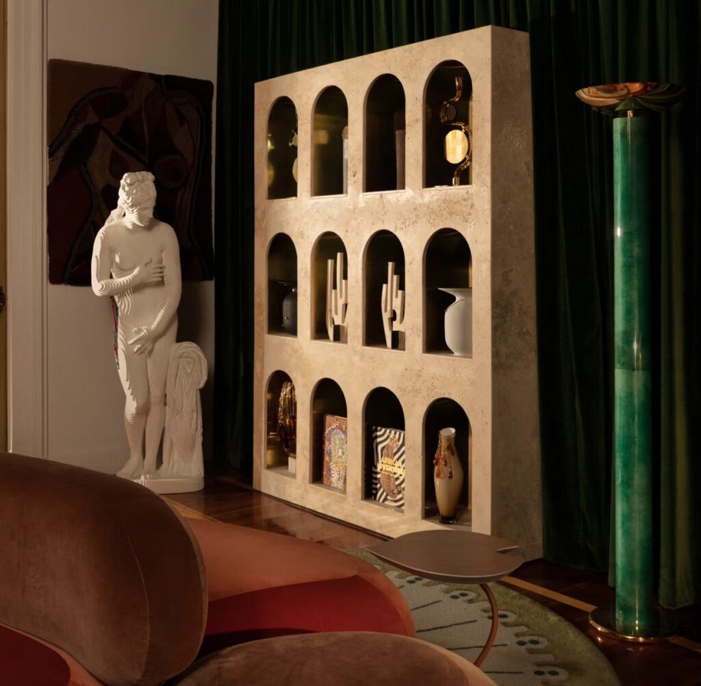 Entertainment room with niched storage and malachite floor lamp