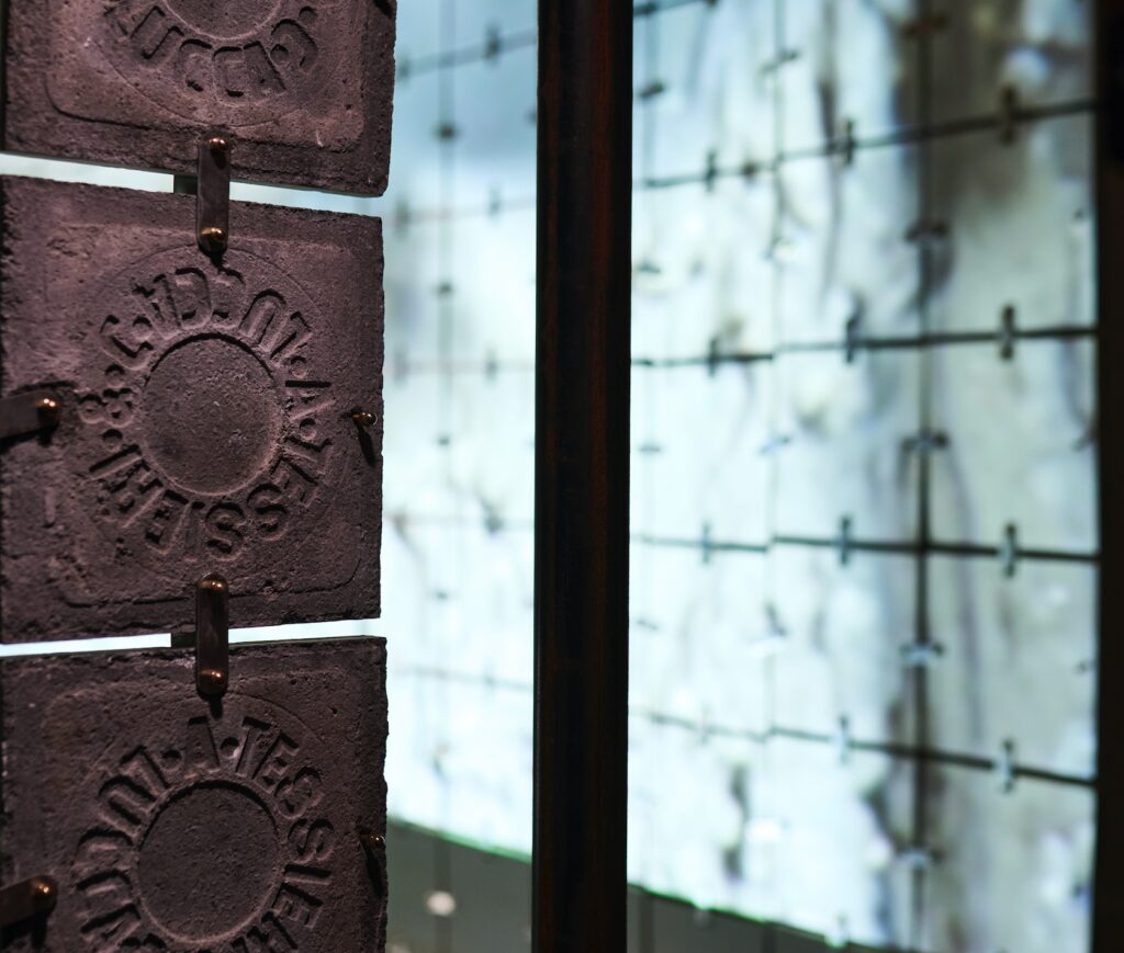 Close up view of tiles joined by fasteners