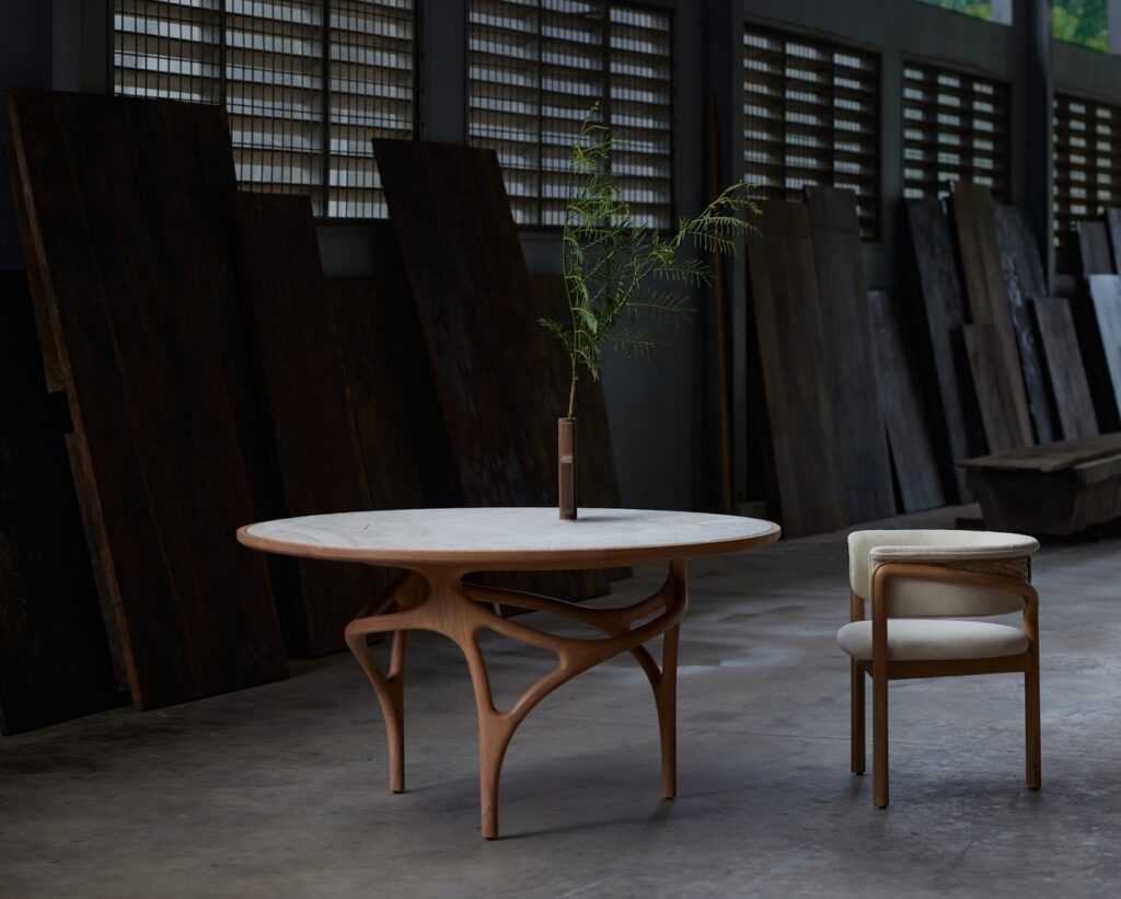 Chair and table with intricate wood carving