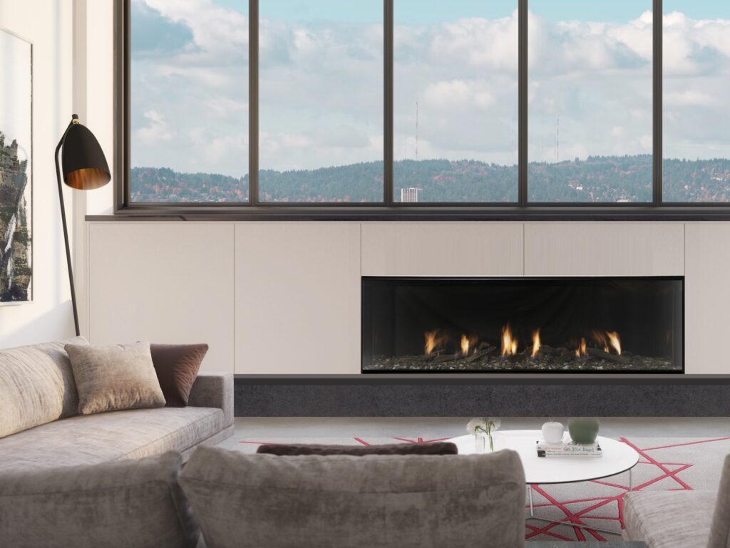 Escea linear fireplace integrated into cabinet with view of hilly landscape