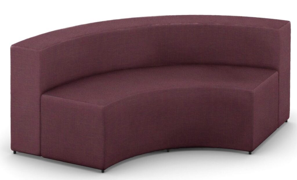 Curved, armless modular lounge sofa upholstered in a deep burgundy fabric. The piece features clean lines, a low back, and subtle black feet, designed for use in commercial or collaborative settings. Fabric shown is Stinson’s Flanders.